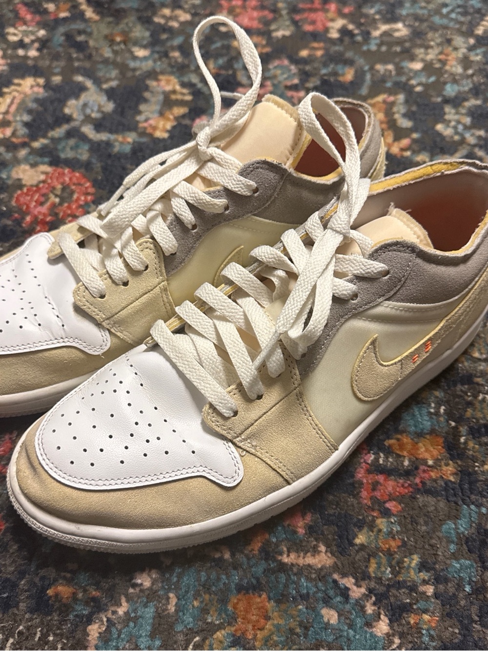 Nike Low-Top Sneakers in White, Cream & Gray with Gold Swoosh